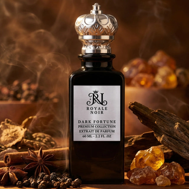 Royale Noir Dark Fortune perfume bottle with spices, oud and amber in the background