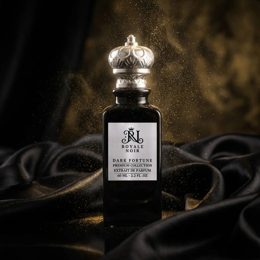 Dark Fortune Extrait De Parfum  Premium Collection by Royale Noir – Elegant perfume Black Bottle With Silver Label And Silver Crown Cap on a dark fabric background.