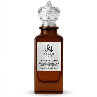 Freaking Hot Extrait De Parfum Premium Collection by Royale Noir – Elegant Fragrance in Transparent Brown Bottle With Silver Label And Silver Crown Cap.