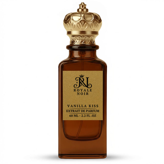 Vanilla Kiss Extrait De Parfum by Royale Noir – Elegant Fragrance in Transparent Brown Bottle With Gold Label And Gold Crown Cap.